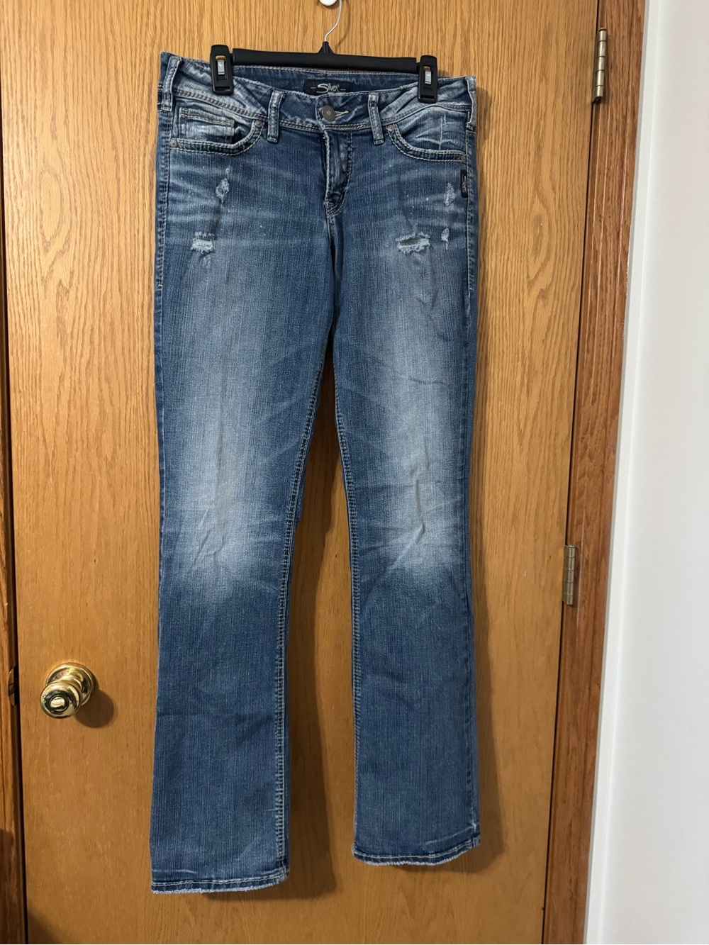 Silver Jeans Women's Blue Bootcut Jeans with Light Distressing